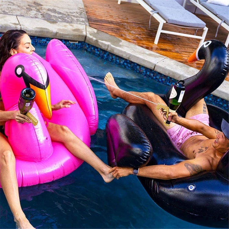 Bottle-shaped bubbly squirt gun with plastic wrap used in a pool