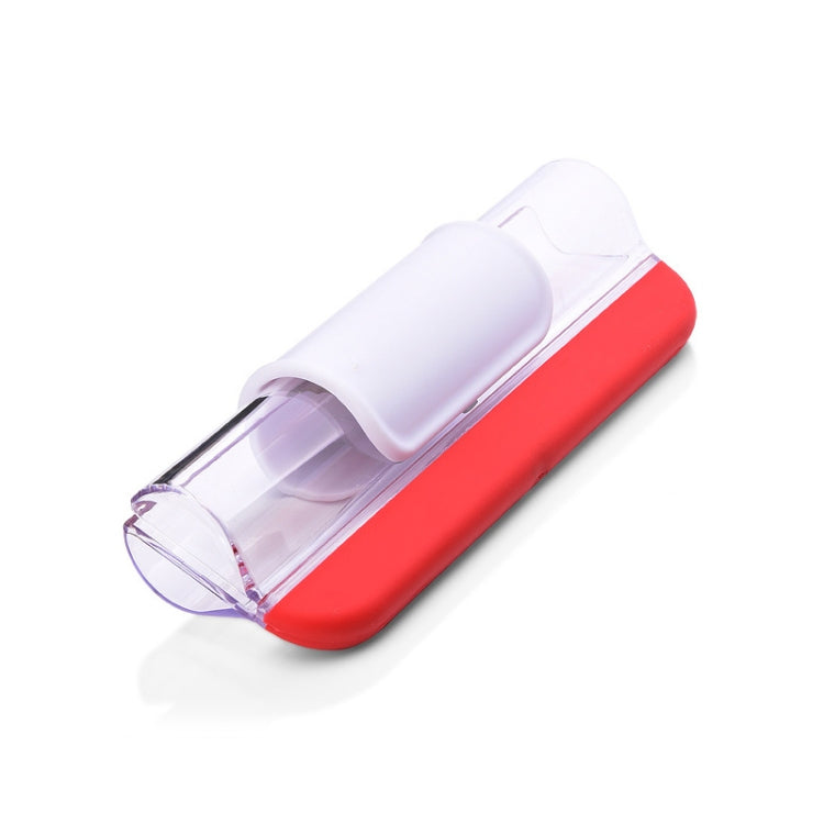 Red and white cherry tomato slicer with clear container, handheld design