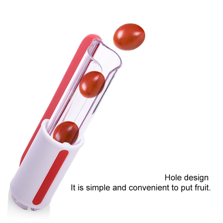 Red and white tomato slicer with open top and multiple cutting holes