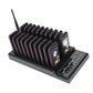 Wireless paging base with dark purple pagers, call screens, and keypad on black dock