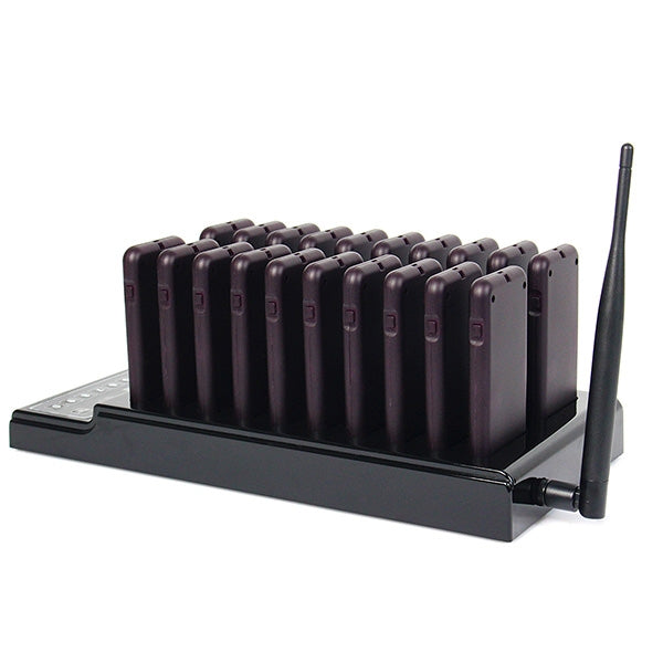 Wireless queue calling base with antenna and upright dark pagers in charging rack