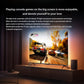 RGB light strip synced with a TV, casting warm ambient glow around the entertainment unit