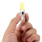 LED dimmable plug bulb held in hand, transparent body with yellow light strip