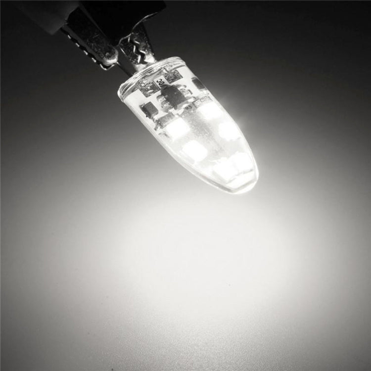 Glowing clear 12-SMD LED capsule with two pins emitting bright white light