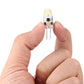 6 LED SMD 2835 silicone module held in hand, two pins exposed