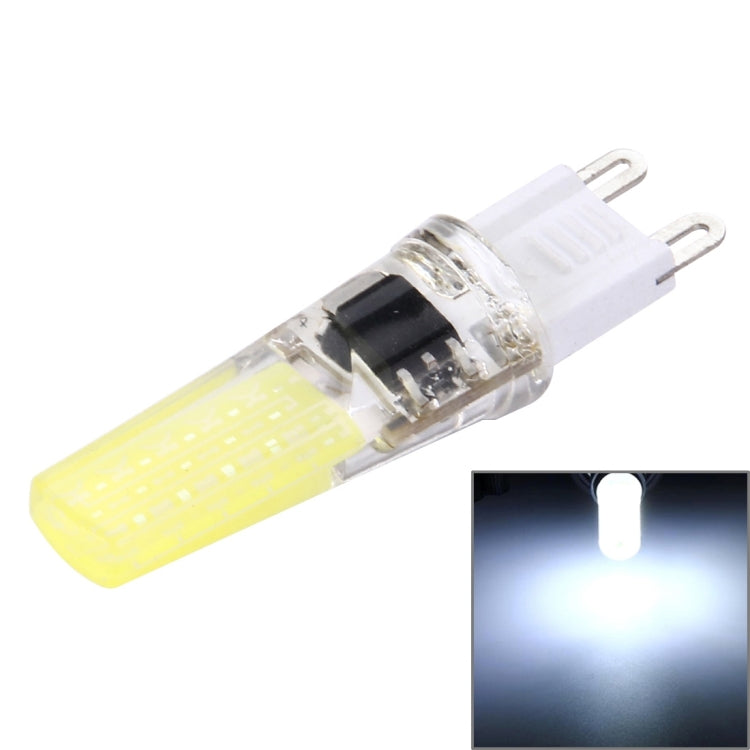 Dimmable LED plug bulb, clear body with white light strip and two pins
