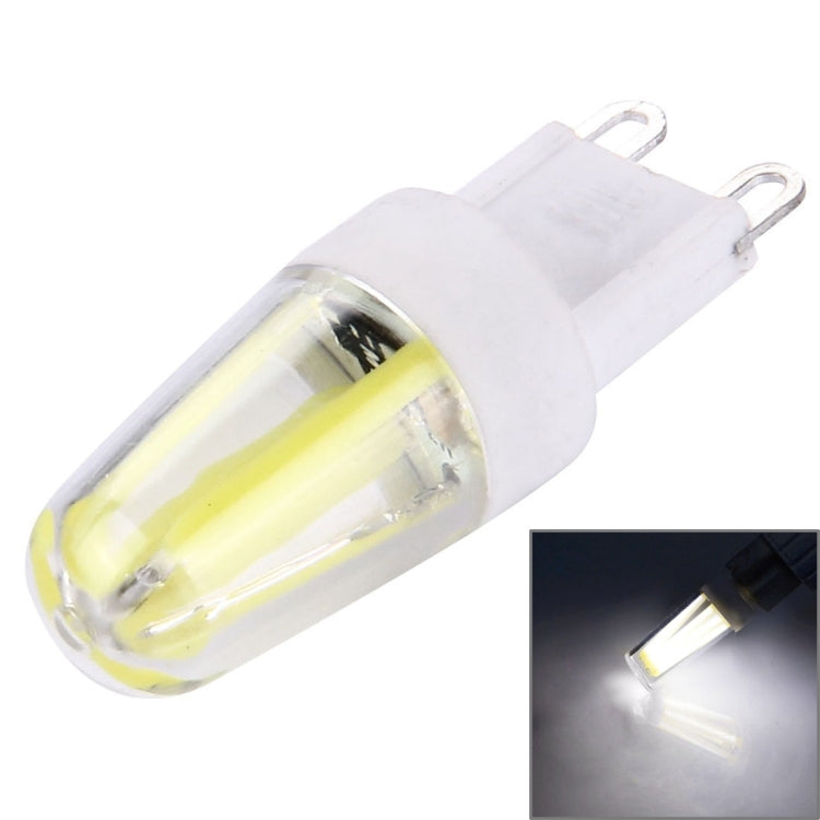 G9 dimmable LED bulb with clear glass and two-pin base, yellow filament