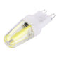 G9 dimmable LED bulb front view, clear glass tube and two-pin base