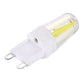 G9 dimmable LED bulb side view with two-prong base and clear glass tube