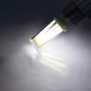 G9 dimmable LED bulb lit, warm white light emitting from clear glass