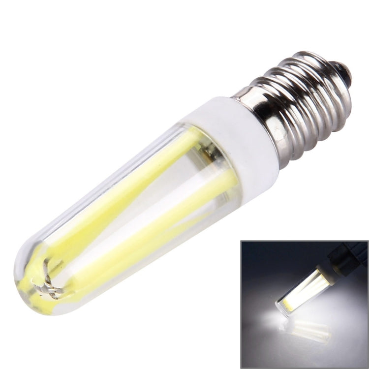 Dimmable E14 LED bulb with clear glass tube and glowing filaments, white light