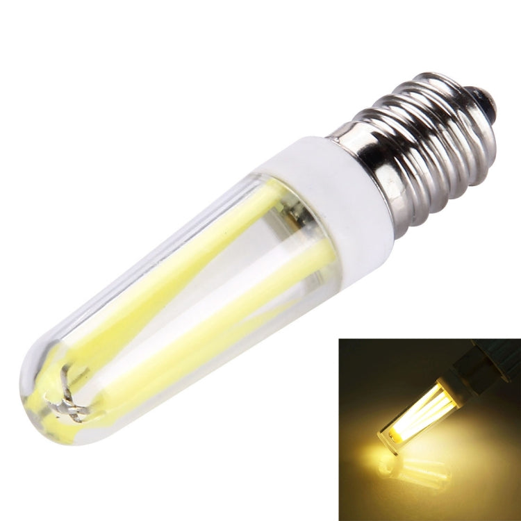 Dimmable E14 LED bulb, clear glass tube with glowing filament, warm yellow light