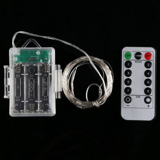 LED fairy light set with clear battery box, coiled string wire, and remote control