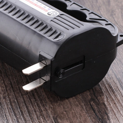 Black rechargeable LED flashlight with two-prong plug and vented casing