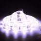 Lit waterproof LED strip light with 30 SMD LEDs showing bright white glow