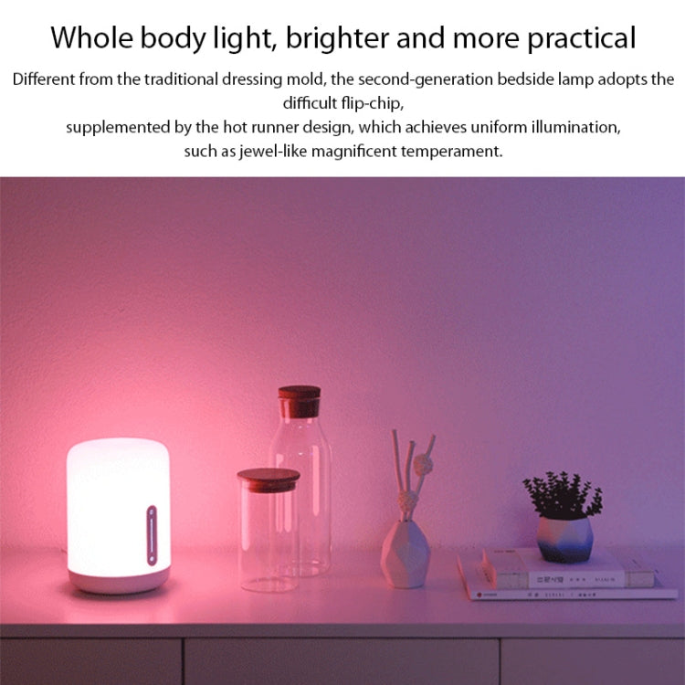 Compact white bedside night light lamp casting soft ambient glow