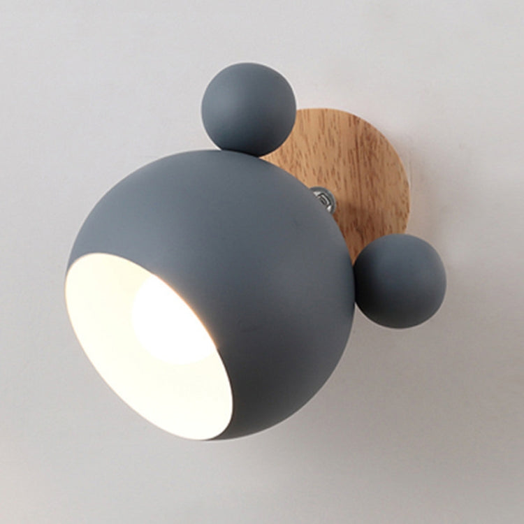 Grey cartoon wall lamp with globe shade and wooden round backplate
