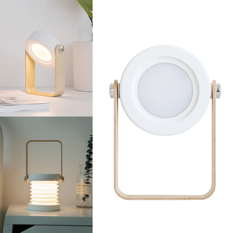 White rechargeable LED lantern lamp with circular glow, foldable handle frame
