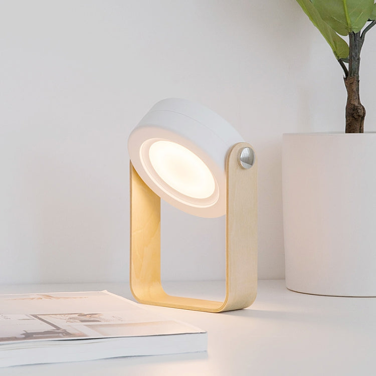 White lantern lamp with warm glow window, wood-style handle and side fasteners