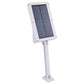 Solar LED light with built-in solar panel, white housing and standing bracket