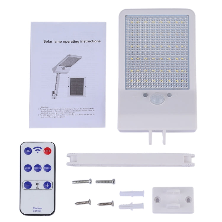 Solar LED wall light kit with remote control, parts, and instruction sheet