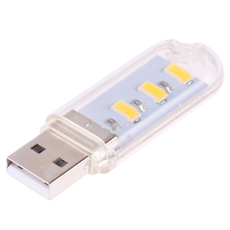 USB connector LED light with three yellow LED chips in clear plastic casing.