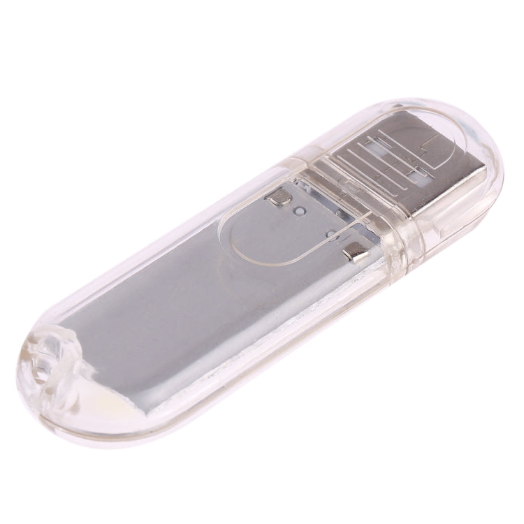 USB LED book light with clear body and metal USB connector, three internal LEDs.