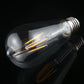 ST64 LED filament bulb with warm-white glowing filaments and E27 screw base.