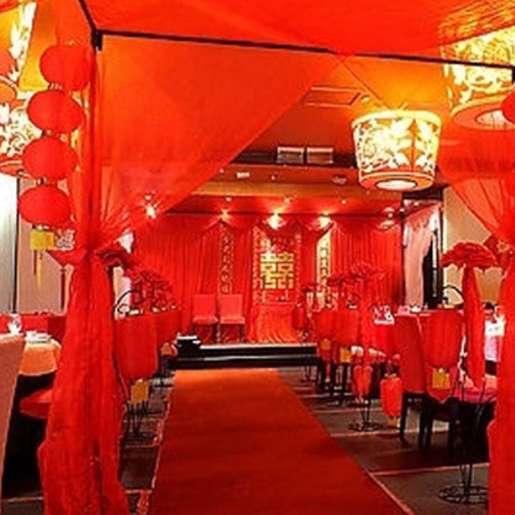 Glowing red LED bulbs hanging in festive Chinese-style corridor decor