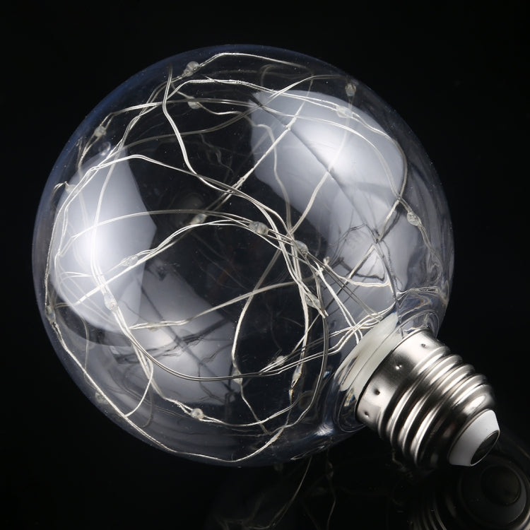 Retro filament LED bulb with E27 screw base and white wire filaments inside clear globe, unlit