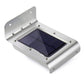 Silver solar wall light with backplate and blue solar panel window
