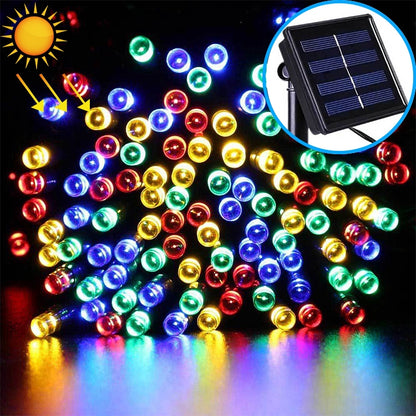 Multicolor LED string lights with glowing round bulbs on a dark backdrop