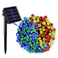 Solar-powered LED string light with black stake, solar panel, and multicolor bulbs