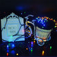 Glowing multicolor LED string lights draped across outdoor decor props
