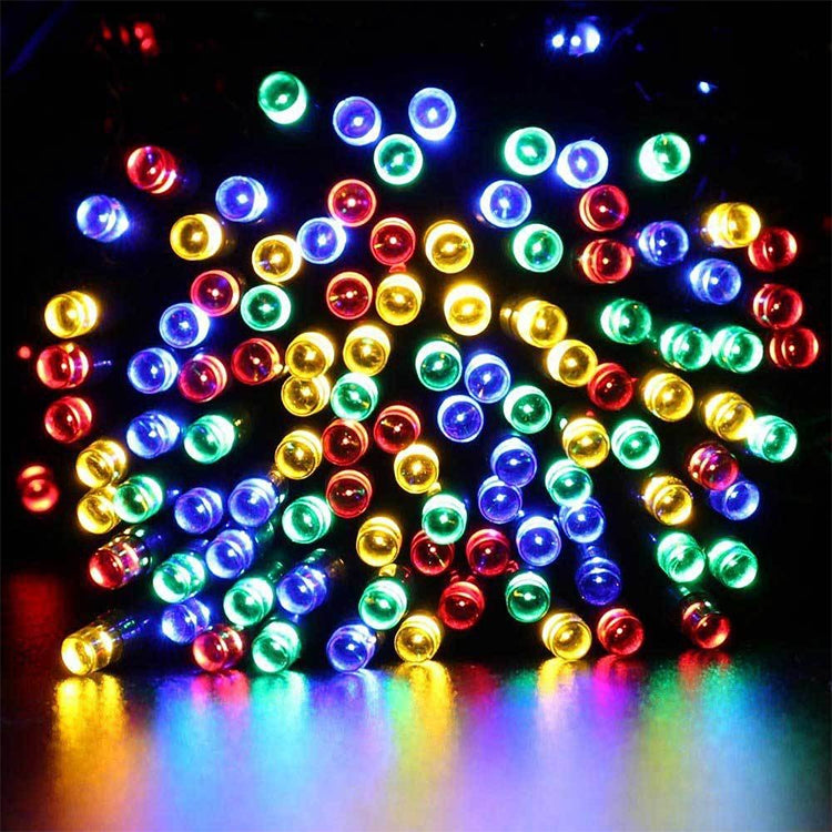 Close-up multicolor LED string lights with small round glowing bulbs