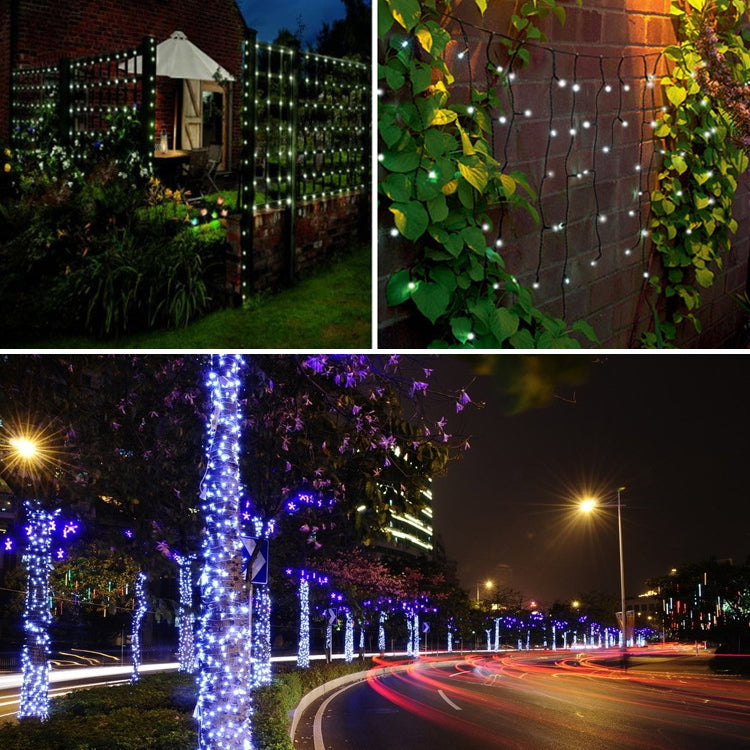 Outdoor LED string lights on fence and building walls at night