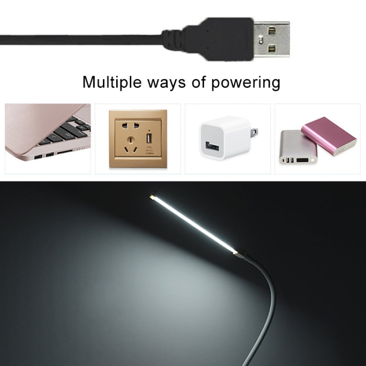 Black LED desk lamp with USB cable for powering from compatible chargers.