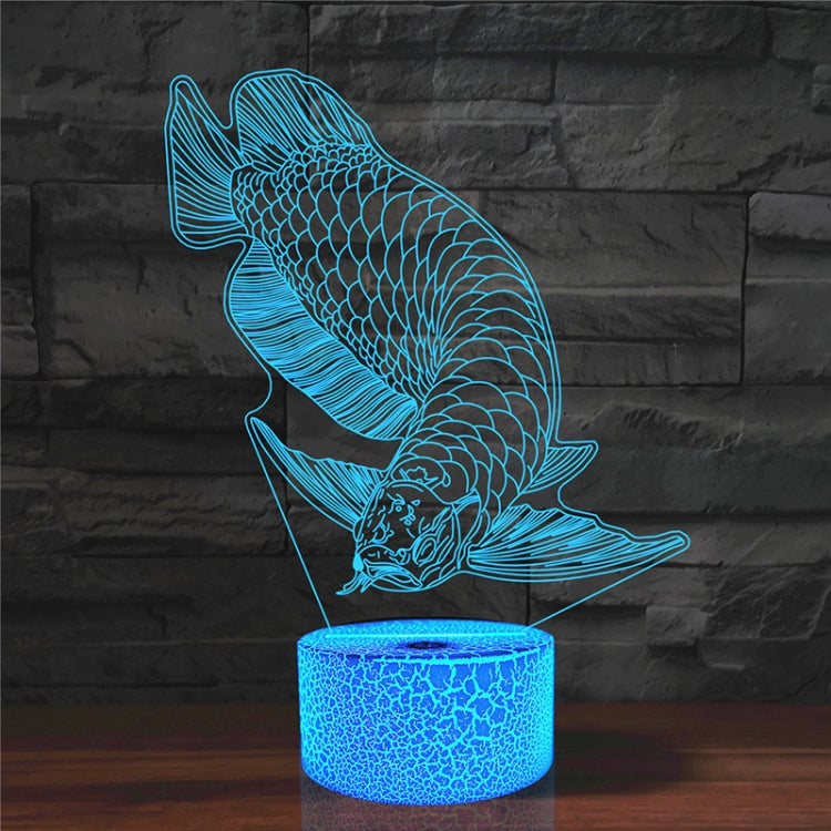 Fish-shaped 3D LED table lamp with blue glowing base and crack-touch design