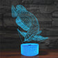 Fish-shaped 3D LED table lamp with blue light and glowing cylinder base