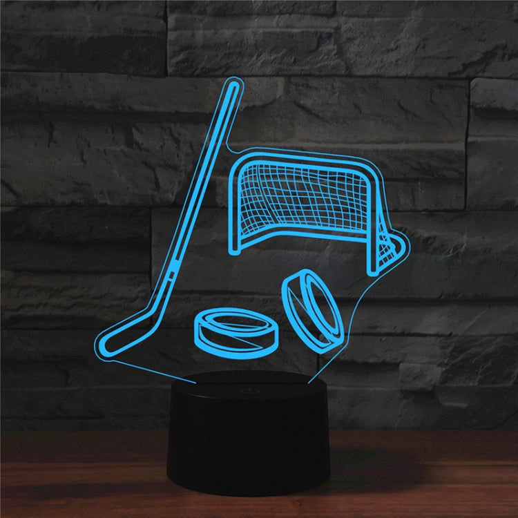 Blue 3D LED hockey table lamp with stick, goal frame, puck, and helmet shapes