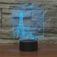 Lighthouse-shaped 3D LED table lamp with blue neon outline glow and black base