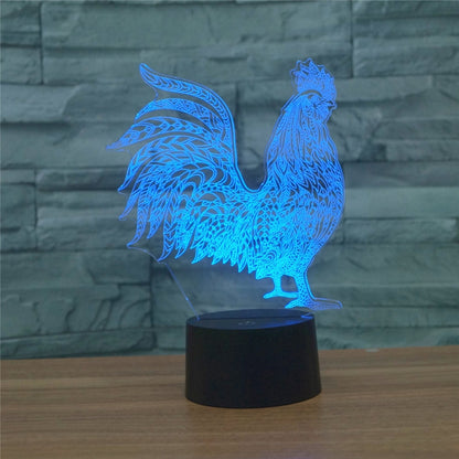 Blue 3D rooster LED table lamp with decorative silhouette on black base