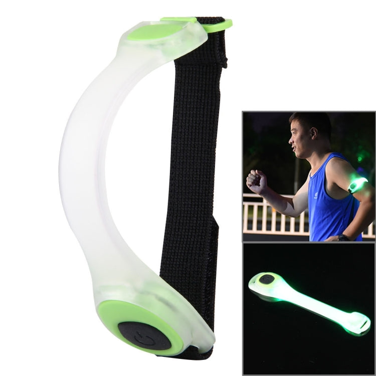 White and green LED safety wristband with black button and black strap.