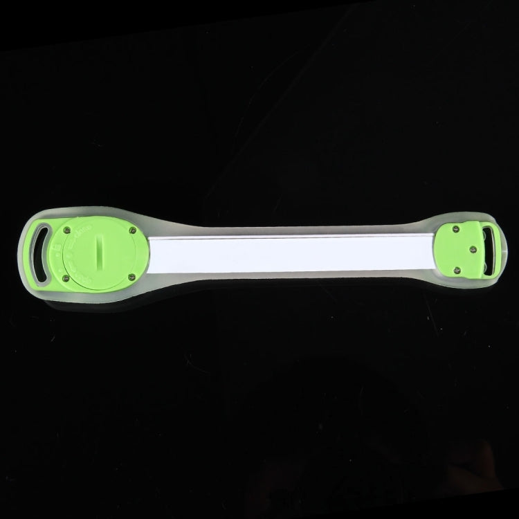 Green-faced LED wristband with black side button, white strap body.