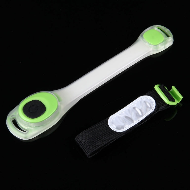 White LED wristband with green light button, plus fabric holder accessory.