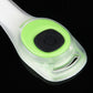 Close-up of green LED light button on white wristband body.
