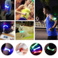 LED safety wristband glow on multiple people, showing green and blue light modes.