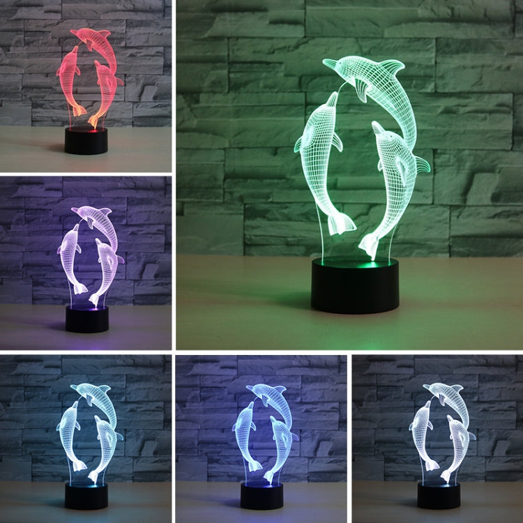 3D LED dolphin lamp shown in multiple colors on a black base
