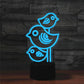 Three-bird LED table lamp with blue light and black cylindrical base
