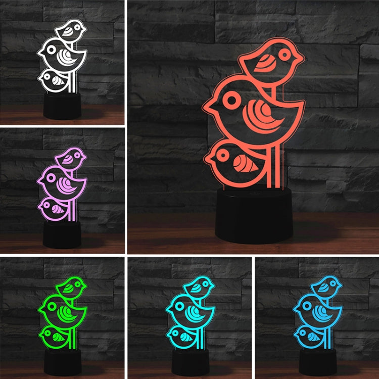 Three-bird LED table lamp shown in multiple colors on black base